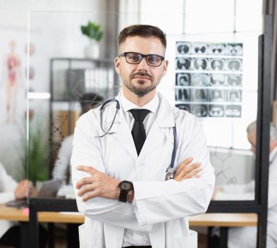 caucasian-doctor-man-in-eyewear-posing-with-crosse-2022-04-27-03-47-43-utc.jpg